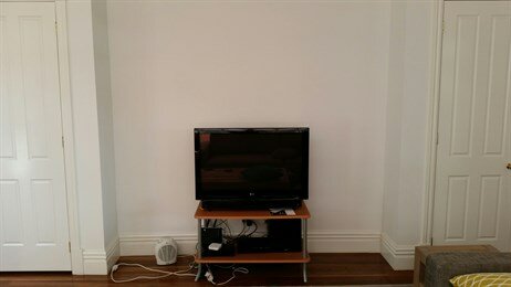 Anita's TV & cabinet before
