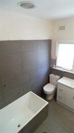 Tiling complete toilet and vanity installed