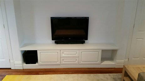 Anita's TV & cabinet after