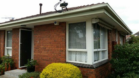 Painting gutters, fascia, eaves and windows before