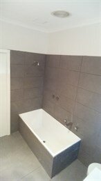Tapes installed and bathroom painted